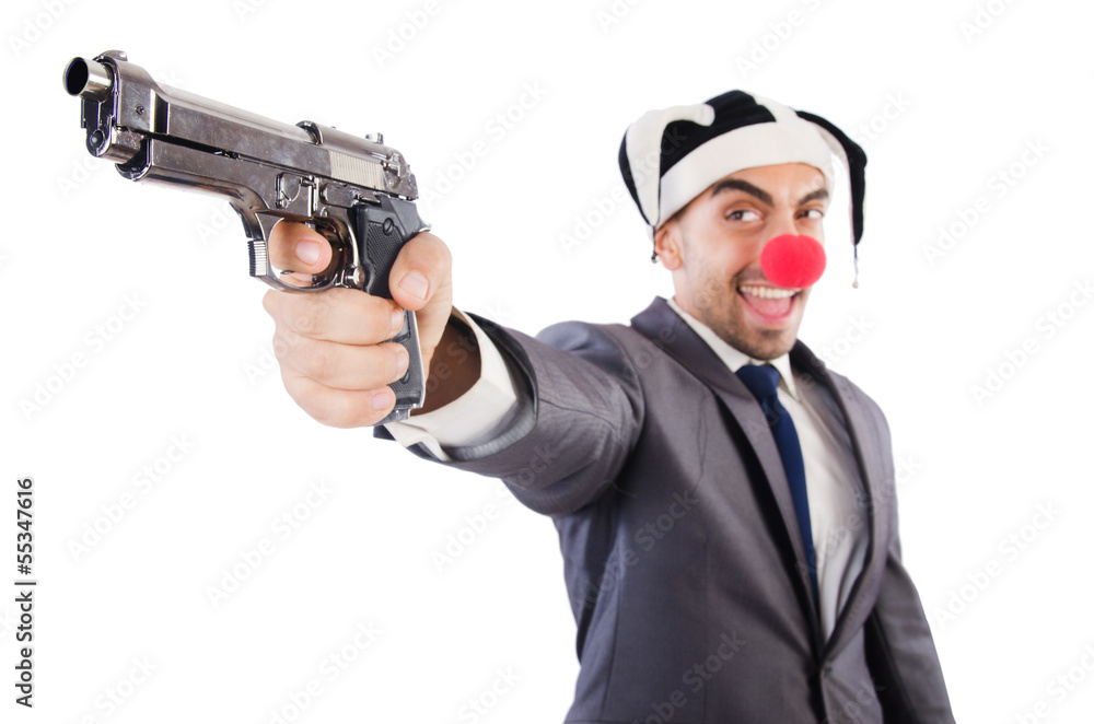 Businessman clown with gun isolated on white Businessman clown with gun isolated on white