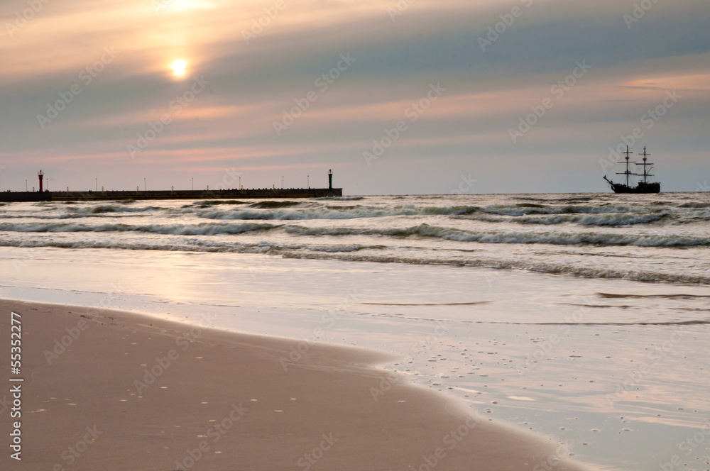 Sunset on the beach. Baltic Sea