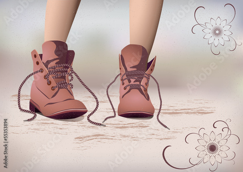 Girls legs in laced boots