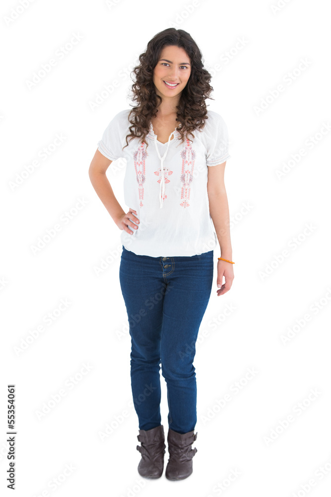 Cheerful attractive brunette wearing casual clothes posing