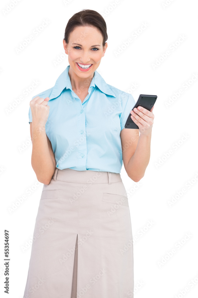 Successful classy businesswoman using calculator Successful classy businesswoman using calculator