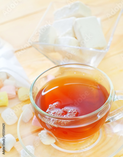 Fresh tea with candy
