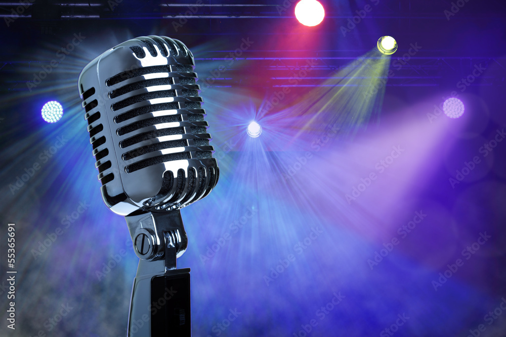 Naklejka premium Vintage microphone on stage