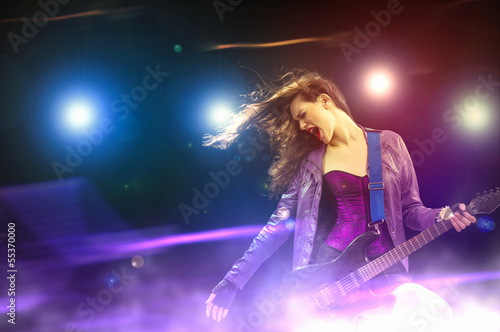 Rock passionate girl with black wings © Sergey Nivens