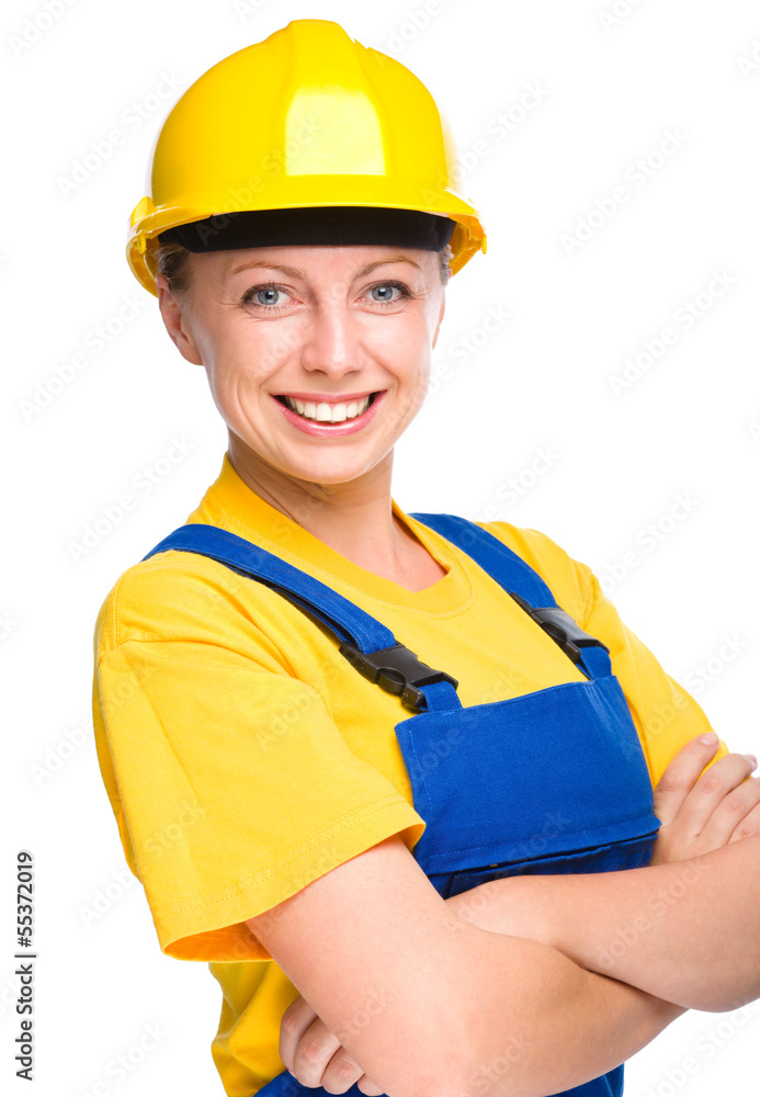 Young happy lady as a construction worker Young happy lady as a construction worker