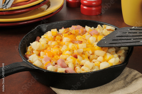 Diced ham and potatoes with cheddar cheese