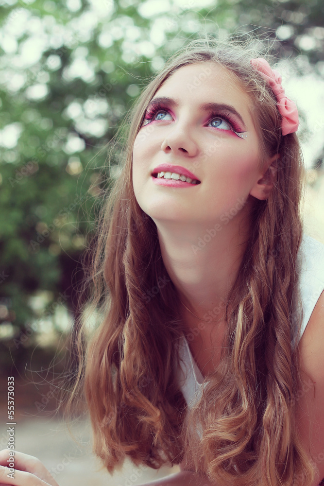 beautiful young girl with long hair and makeup beautiful young girl with long hair and makeup
