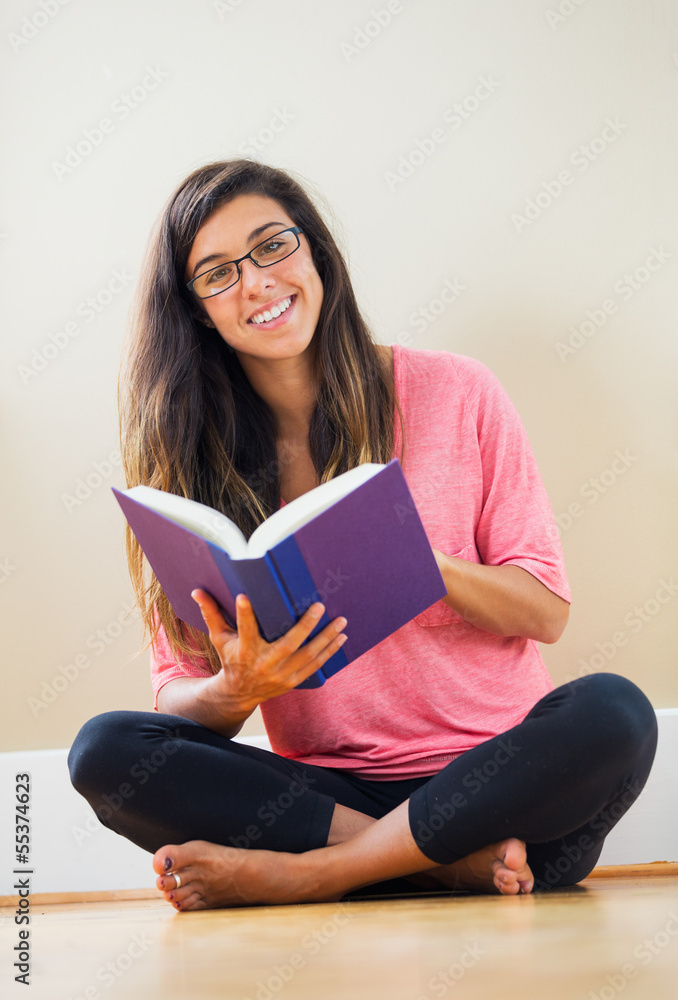 happy young woman reading a book happy young woman reading a book
