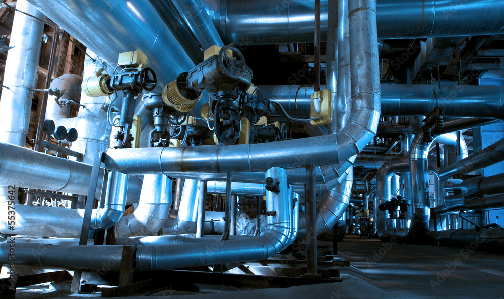Equipment, cables and piping as found inside of a modern industr Equipment, cables and piping as found inside of a modern industr
