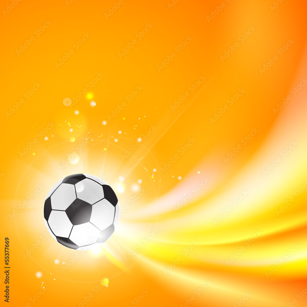 Obraz premium Shining soccer-ball on an orange background