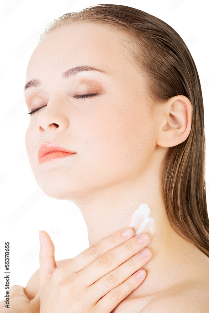 Beautiful woman with healthy skin applying cosmetic cream Beautiful woman with healthy skin applying cosmetic cream