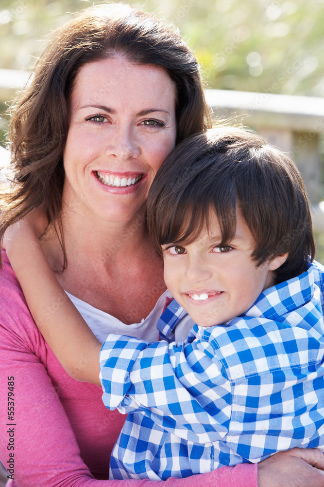 Portrait Of Mother And Son Hugging Outdoors Portrait Of Mother And Son Hugging Outdoors