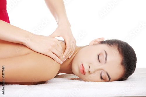 Preaty young woman relaxing heaving massage therapy