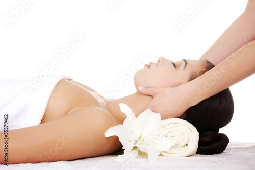 Preaty young woman relaxing heaving massage therapy