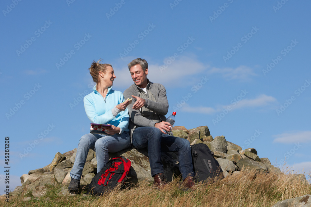 Couple Stopping For Lunch On Countryside Walk Couple Stopping For Lunch On Countryside Walk