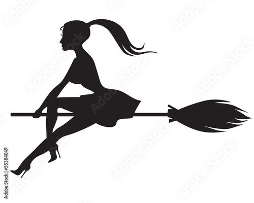 Beautiful witch on a broomstick