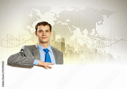 Businessman with blank banner