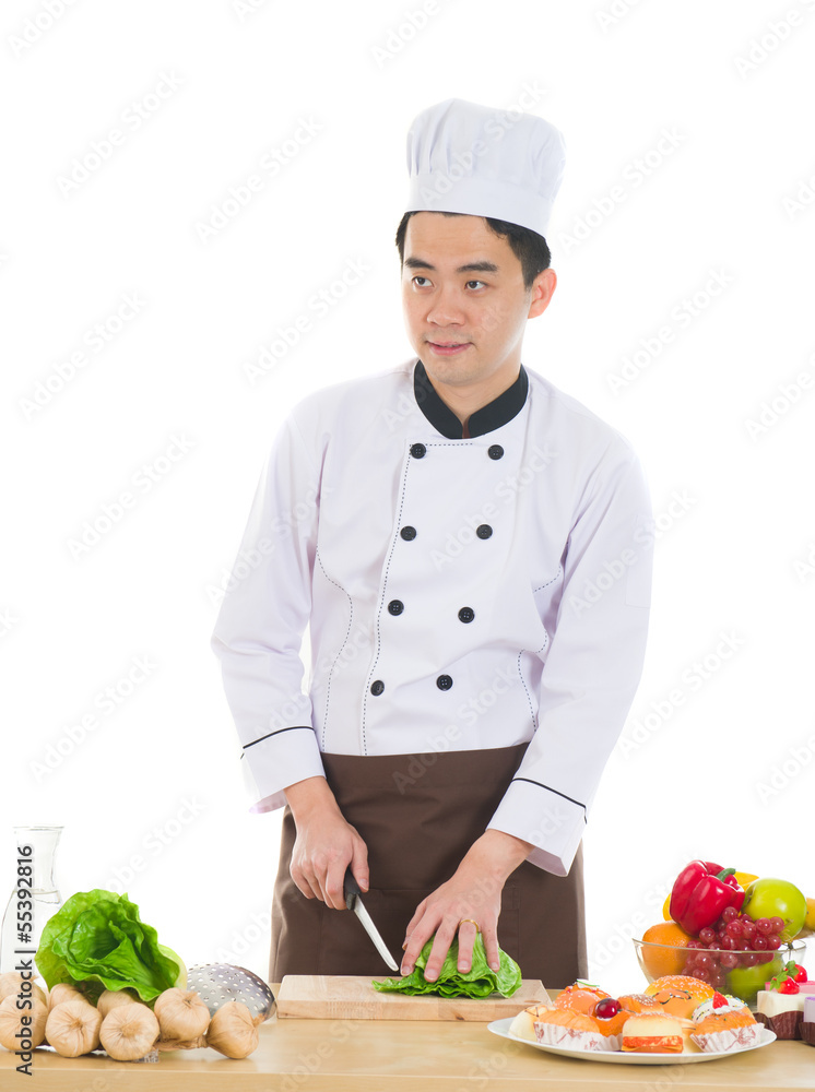Baker holding the tart in commercial kitchen Baker holding the tart in commercial kitchen