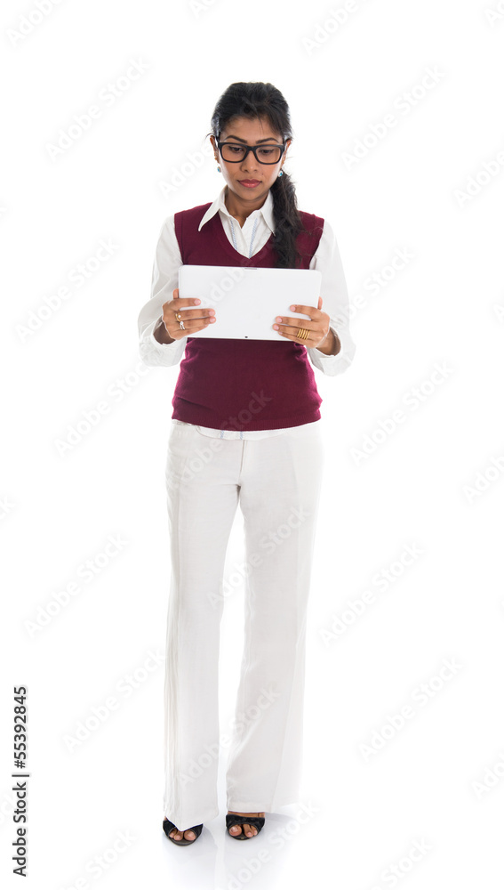 modern indian businesswoman using tablet computer over white bac modern indian businesswoman using tablet computer over white bac