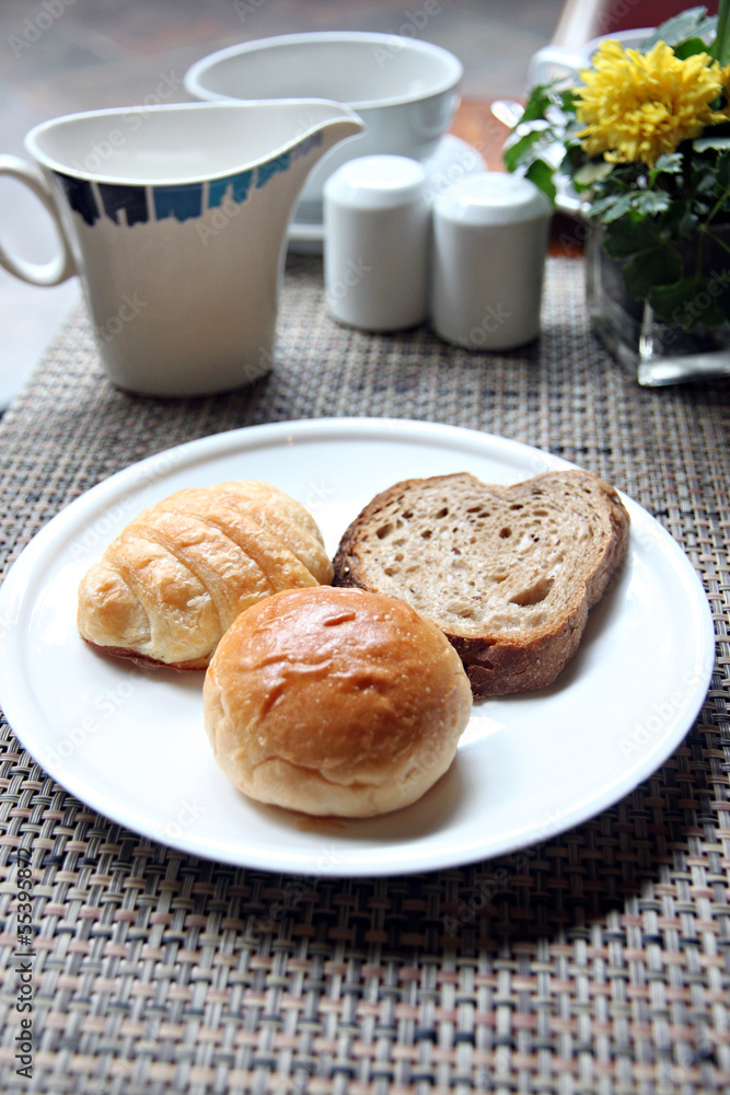 Closeup Bread in a white dish.