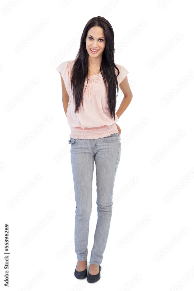 Smiling brunette posing and looking at camera Smiling brunette posing and looking at camera