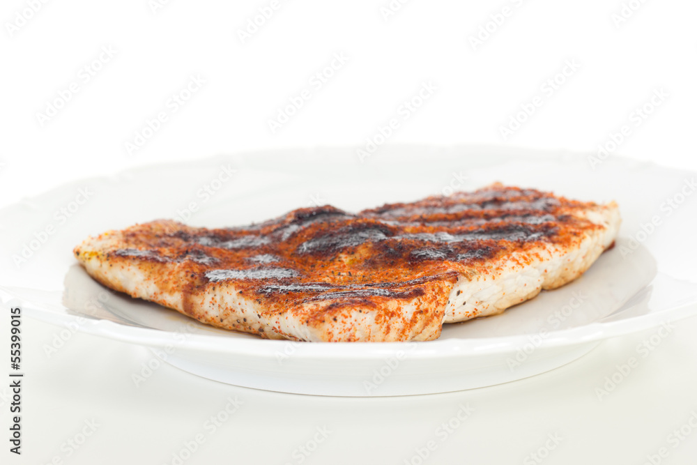 Low-fat chicken filet on white dish
