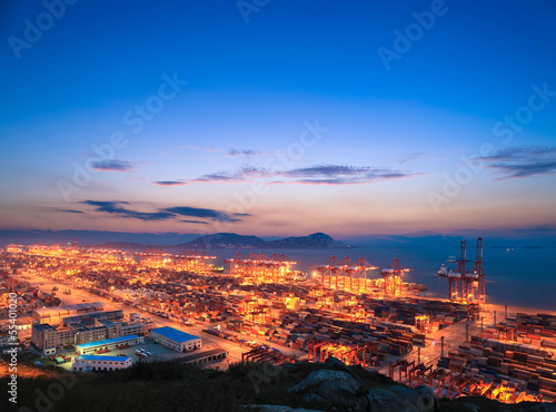 container terminal with sunset glow