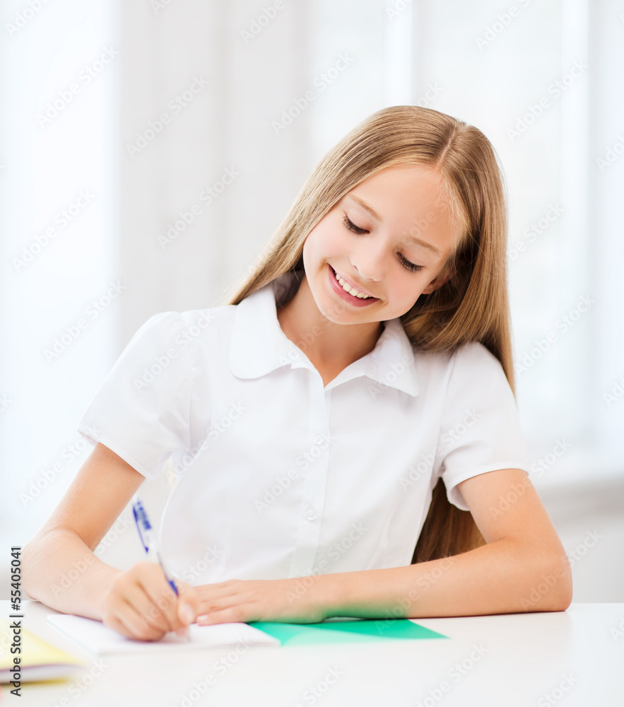 student girl studying at school