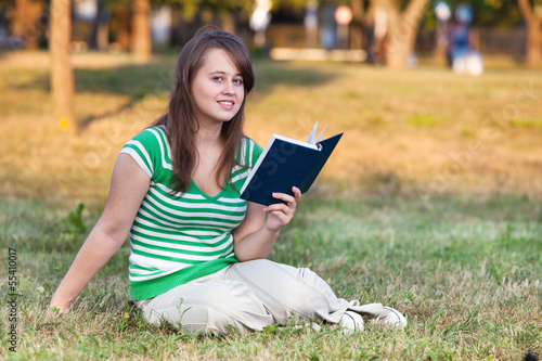 A student in the courtyard of the University