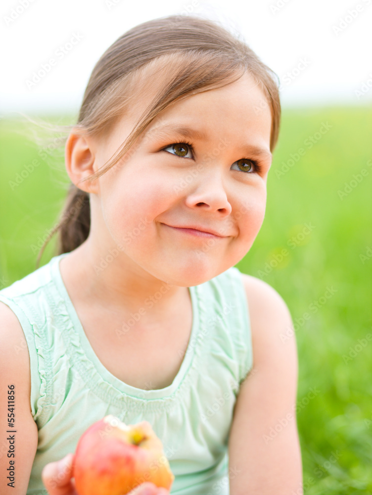 Portrait of a little girl with apple Portrait of a little girl with apple