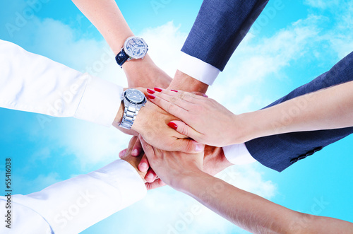 Teamwork,holding hands,handshake,business background