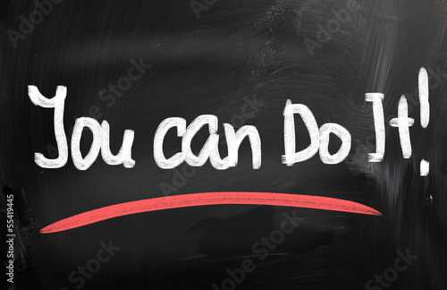 "You can do it" handwritten with white chalk on a blackboard