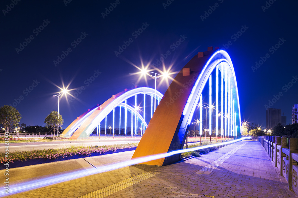 Naklejka premium arch bridge with neon lamp