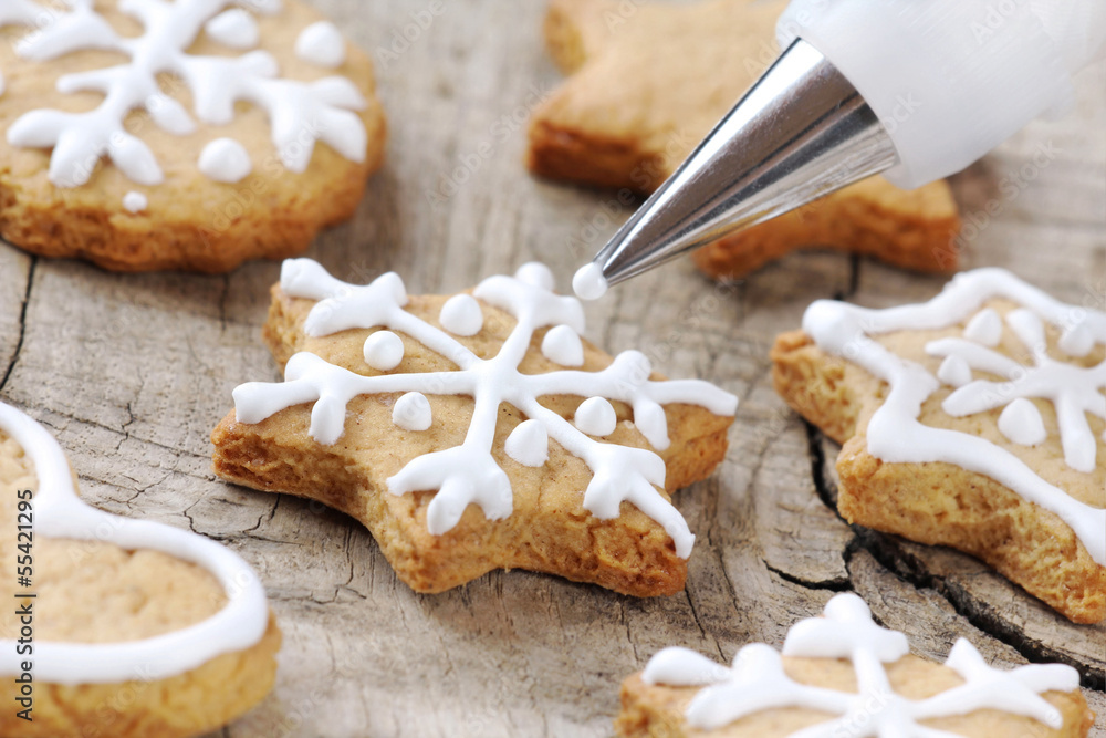 Christmas cinnamon cookies decorating process - obrazy, fototapety, plakaty 