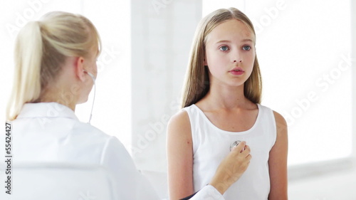 child patient visiting doctor's office