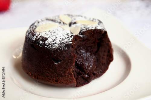 Delicious chocolate fondant with syrup close-up