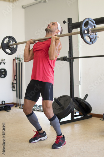 Athlete lifting weights