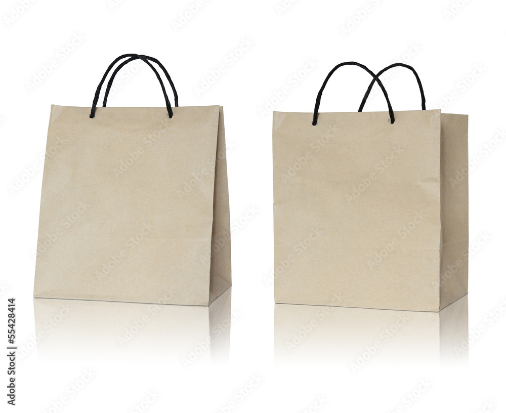Brown paper bag on reflect floor and white background Brown paper bag on reflect floor and white background