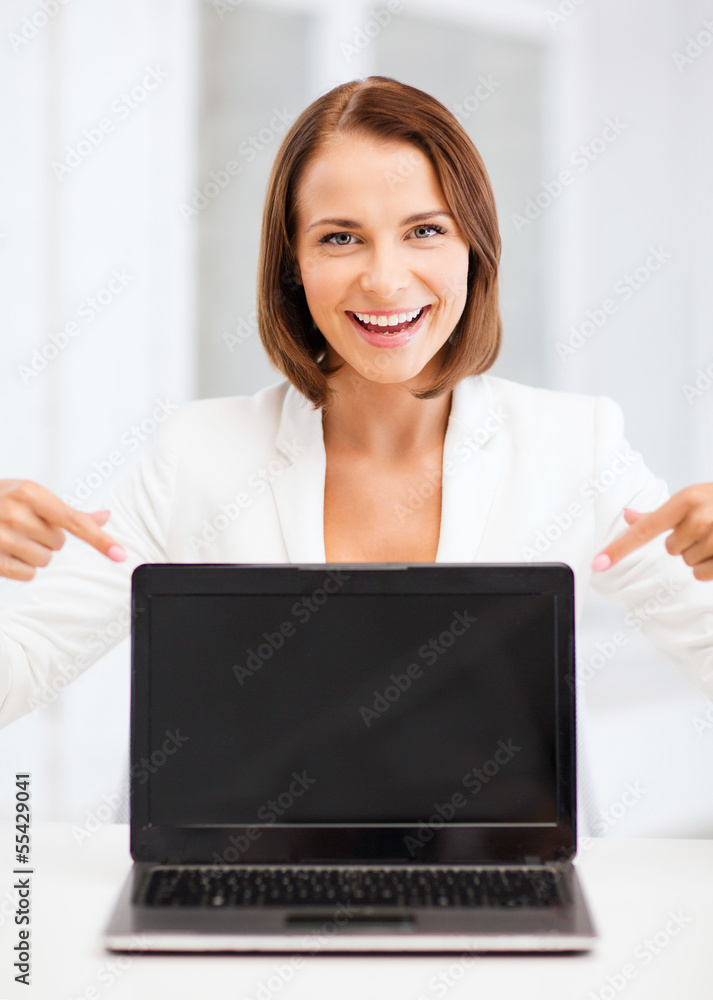 smiling woman with laptop pc