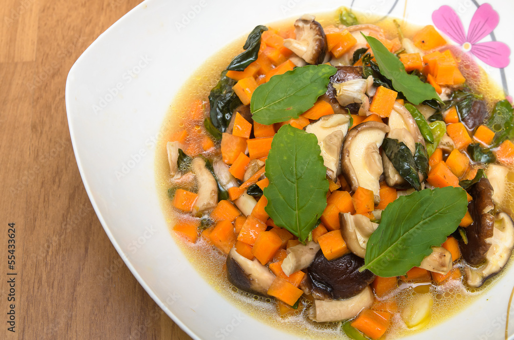 Fried shiitake mushroom and carrot in holy basil Fried shiitake mushroom and carrot in holy basil