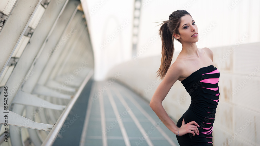 Portrait of sensual brunette caucasian woman with black and purp