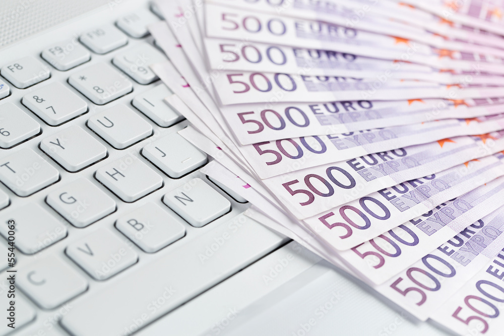 European currency on the computer keyboard European currency on the computer keyboard