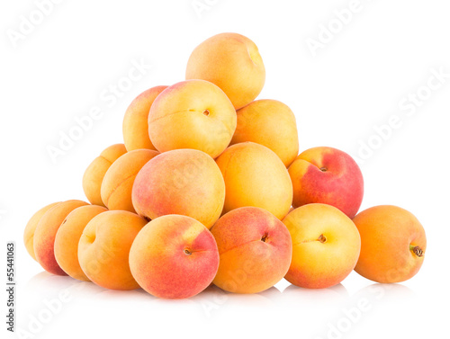 ripe apricots isolated on white background