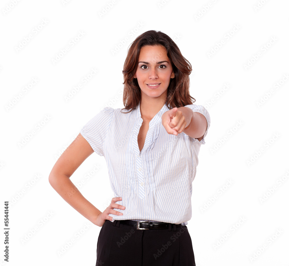 Cute fashionable woman pointing and smiling Cute fashionable woman pointing and smiling