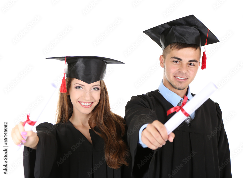 Two happy graduating students isolated on white Two happy graduating students isolated on white