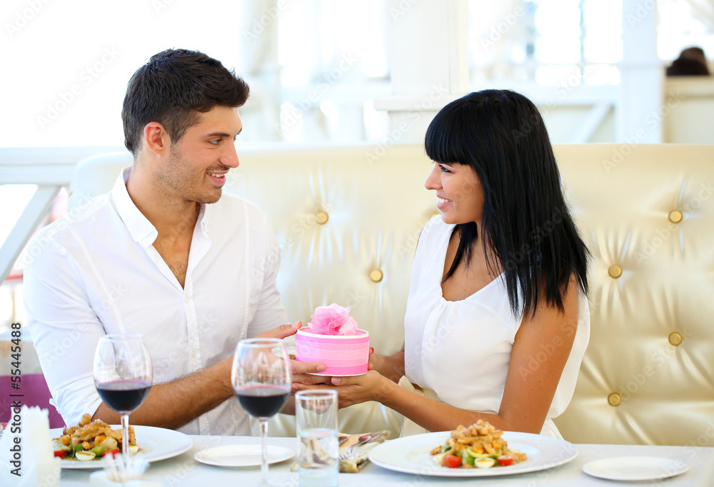 Beautiful couple having  romantic dinner at restaurant