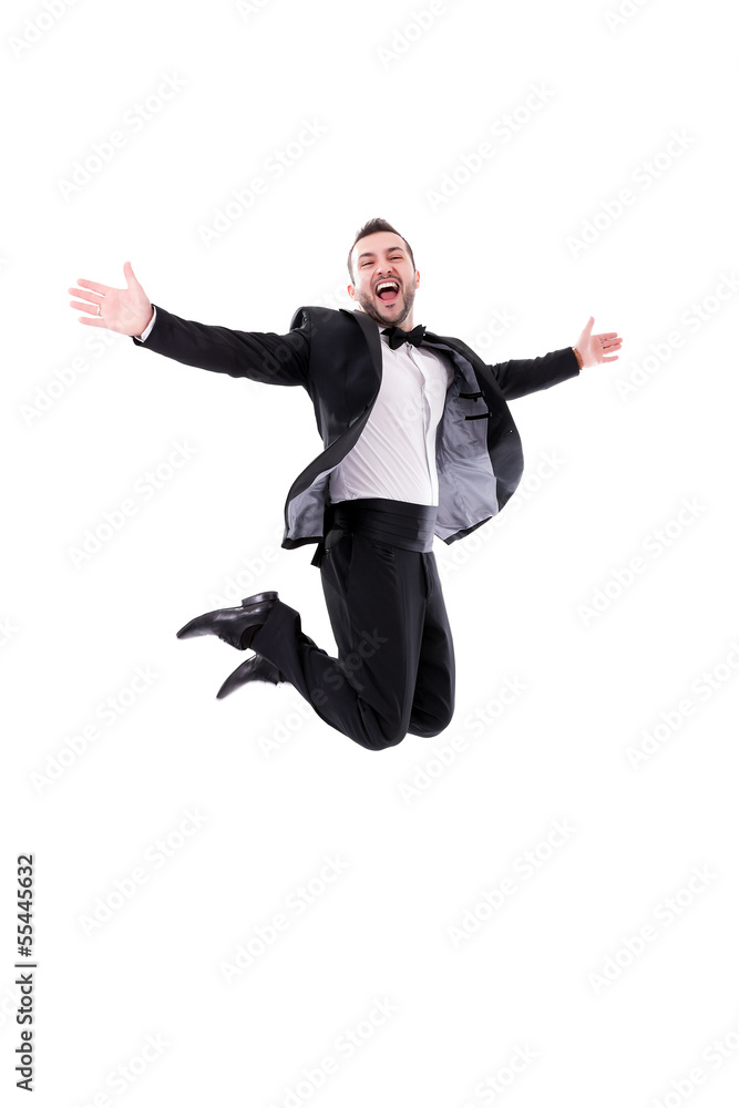 Man Laughing and Jumping Up, Enjoying His Success Man Laughing and Jumping Up, Enjoying His Success