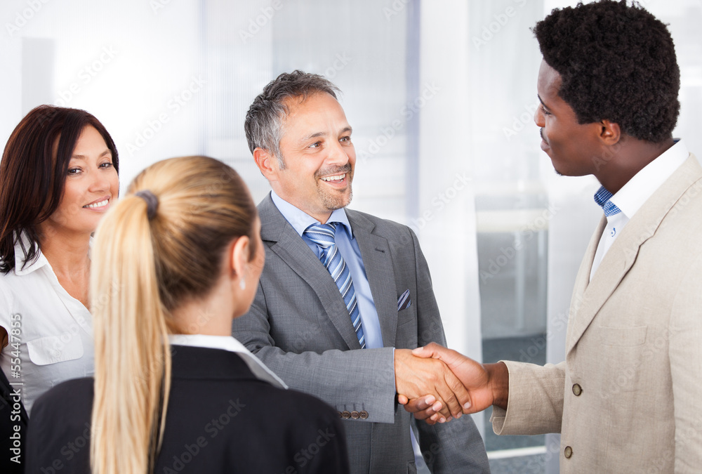 Multiethnic Businesspeople Shaking Hand