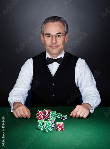 Canvas Print Portrait of a croupier