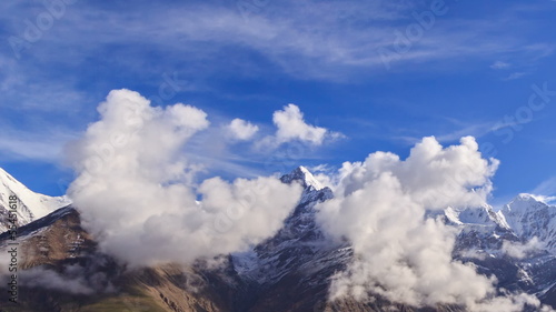 Clouds over glacier Inylchek. Kirgystan, central Tien Shan photo